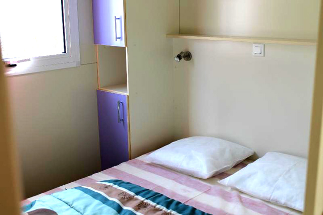 Une chambre du chalet 6 places Une chambre du chalet 6 places